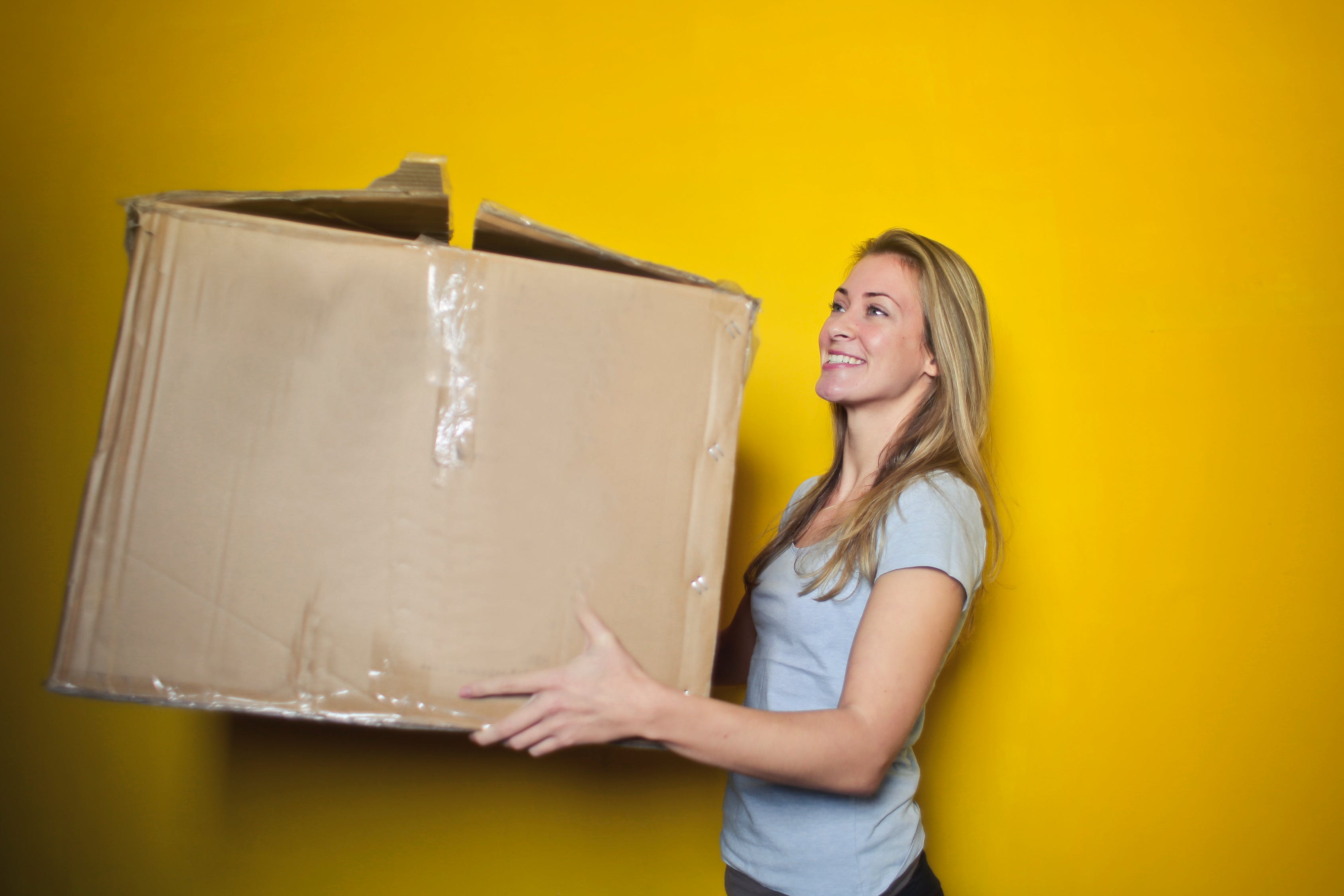 girl holding box